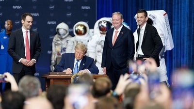 US President Donald Trump signs an executive order to create a US Space Academy at the NASA Johnson Space Center in Houston, Texas, US. (Bloomberg)