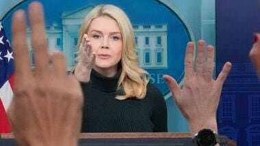 FILE - Reporters raise their hands to ask a question as White House press secretary Karoline Leavitt speaks with reporters in the James Brady Press Briefing Room at the White House, Jan. 26, 2026, in Washington. (AP Photo/Alex Brandon, File)