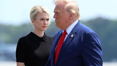 Amid scrutiny of Natalie Harp and Trump's bond, some supporters defend her presence as normal for aides (Getty Images via AFP) Amid scrutiny of Natalie Harp and Trump's bond, some supporters defend her presence as normal for aides (Getty Images via AFP)
