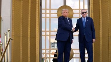 President Donald Trump, left, shakes hands with Turkish President Recep Tayyip Erdogan