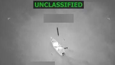 FILE PHOTO: A combination image shows two screen captures from a video posted on the X account of The White House on September 15, 2025, depicting what U.S. President Donald Trump said was a U.S. military strike on a Venezuelan drug cartel vessel that had been on its way to the United States.