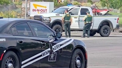 Emergency responders at the site of a fatal shooting incident in Twin Falls, Idaho. (via REUTERS)