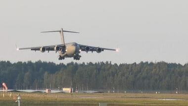 A C-17 Globemaster, believed to be carrying U.S. CIA Director John Ratcliffe, lands near Riga, Latvia, August 25, 2026, in this frame obtained from a social media video.