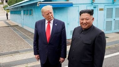 FILE PHOTO: U.S. President Donald Trump meets with North Korean leader Kim Jong Un at the demilitarized zone separating the two Koreas, in Panmunjom, South Korea, June 30, 2019. REUTERS/Kevin Lamarque/File Photo/File Photo