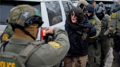 US ICE plans $20M electric shock gloves for officers. (REUTERS)