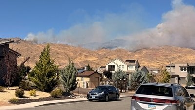 Smoke rises during wildfire in Reno, Nevada, U.S., in this picture taken from social media. (Natalie Wainwright via REUTERS)