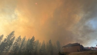 This photo provided by Spokane Fire District 9 shows the Upriver Fire burning northeast of Spokane, Wash., on Tuesday, June 16, 2026. (Robert Gray/Spokane Fire District 9 via AP) (Spokane Fire District 9 via AP)