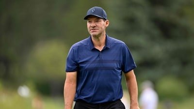 After being placed on leave indefinitely by CBS Sports, Tony Romo discusses personal challenges, including a DUI. (Getty Images via AFP)